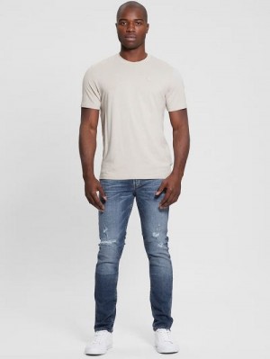 Guess Finnley Distressed Tapered Jeans Albastri | GUESS-SN30421